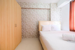 Cozy 2BR Bassura City Apartment with City View By Travelio